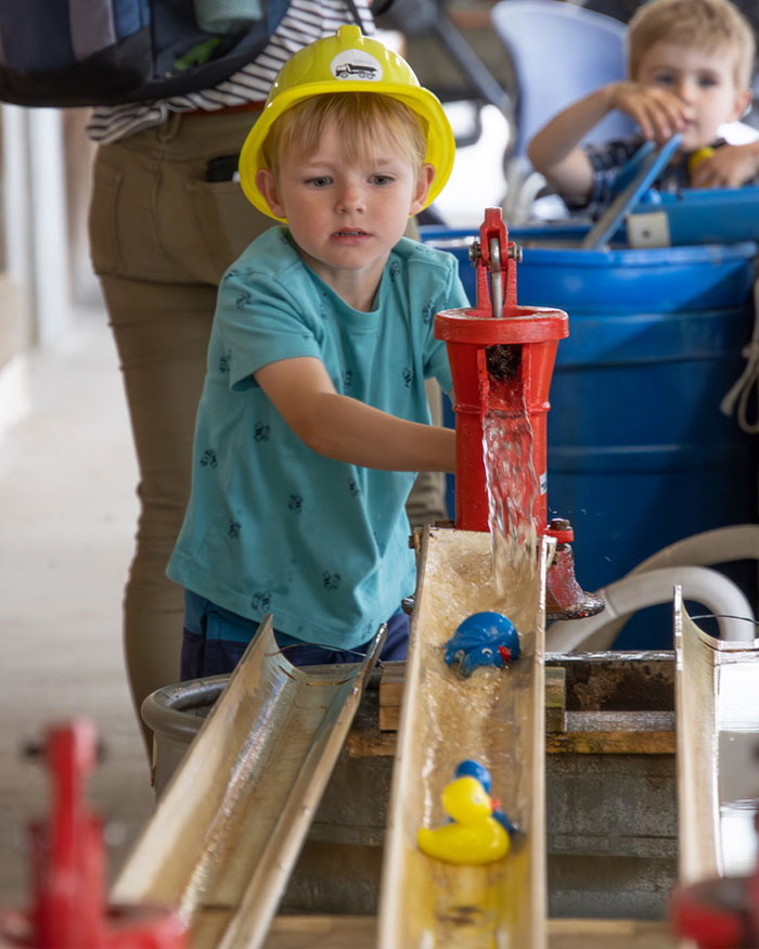Kid Doing Duck Races Kid Doing Duck Races